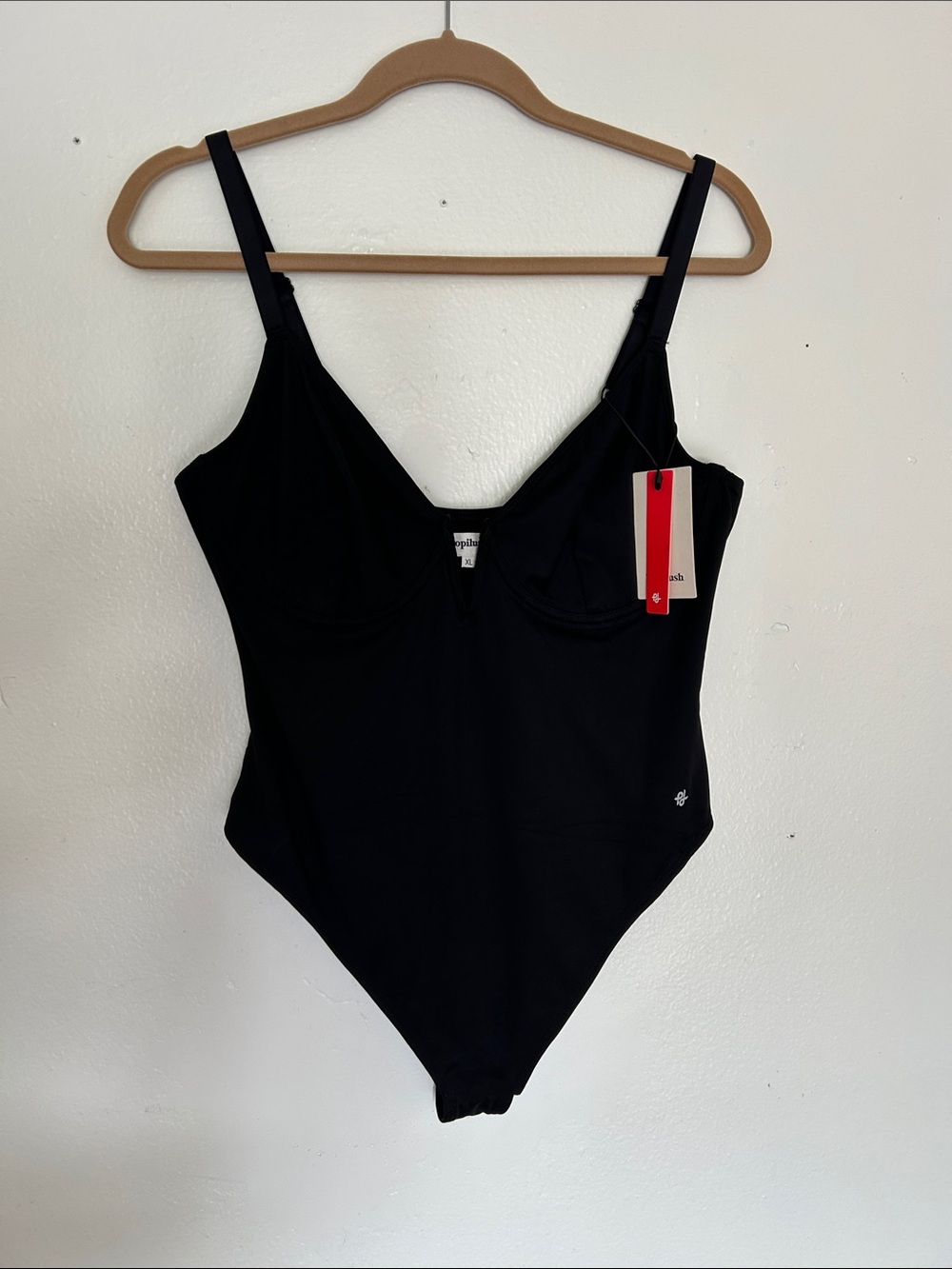 Black popilush Bodysuit NWT. Thong bottom. Adjustable Straps